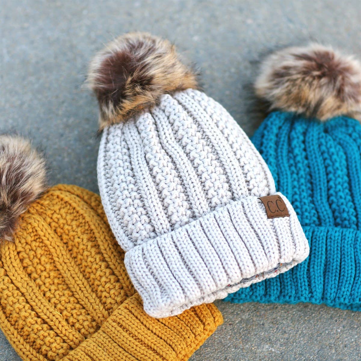 C.C Luxe Fleece-Lined Beanie with Bold Faux Fur Pom